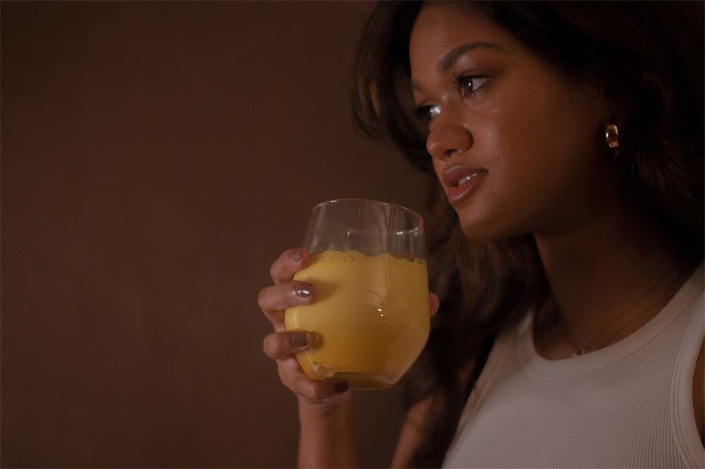 Vita, the fictional influencer in artist Divaagar’s soft salves (2021) partakes in a healthy – and trendy – turmeric latte