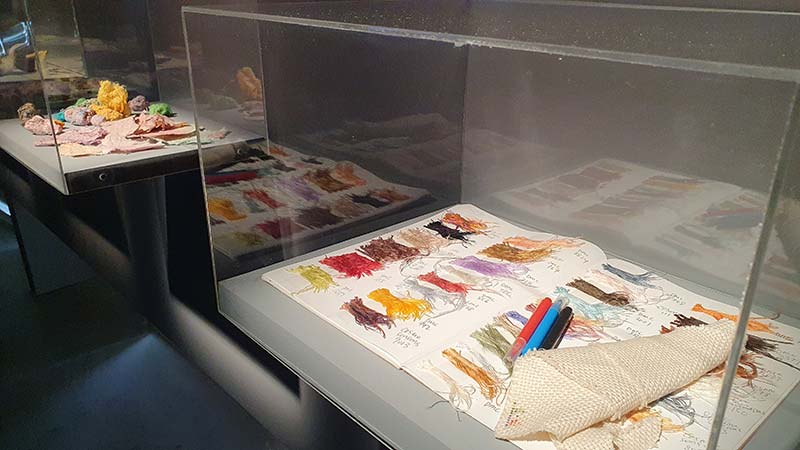 This particular vitrine shows Jodi Tan’s colour reference of cotton floss threads in her sketchbook.