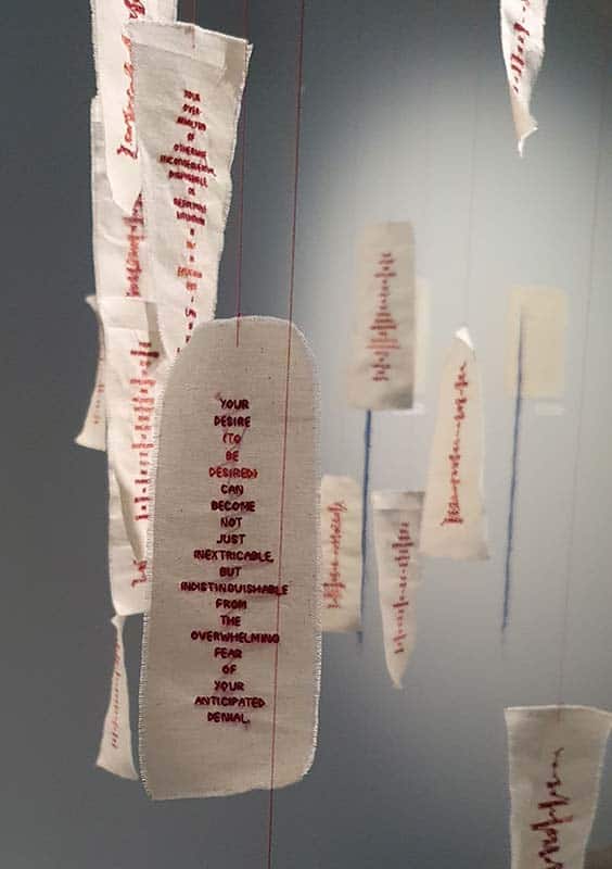 Berny Tan, Talismans for Disentanglements (2021) reference the form of Taoist paper talismans. Text reads: “Your desire (to be desired) can become not just inextricable, but indistinguishable from the overwhelming fear of your anticipated denial.”