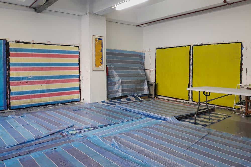 Sheets of tarpaulin in Kanchana Gupta studio.